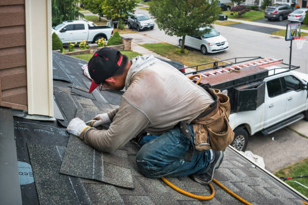 Professional Roofing technician working in Bishop, GA